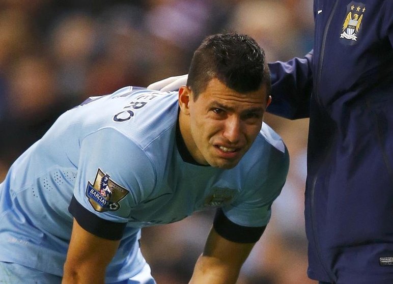 sergio-aguero-of-manchester-city-reacts-after-sustaining-an-injury-during-their-english-premier-league-soccer-match-against-everton-at-the-etihad-stadium-in-manchester-min